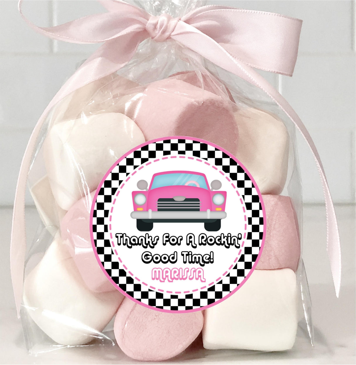 1950s diner theme party label with pink retro automobile