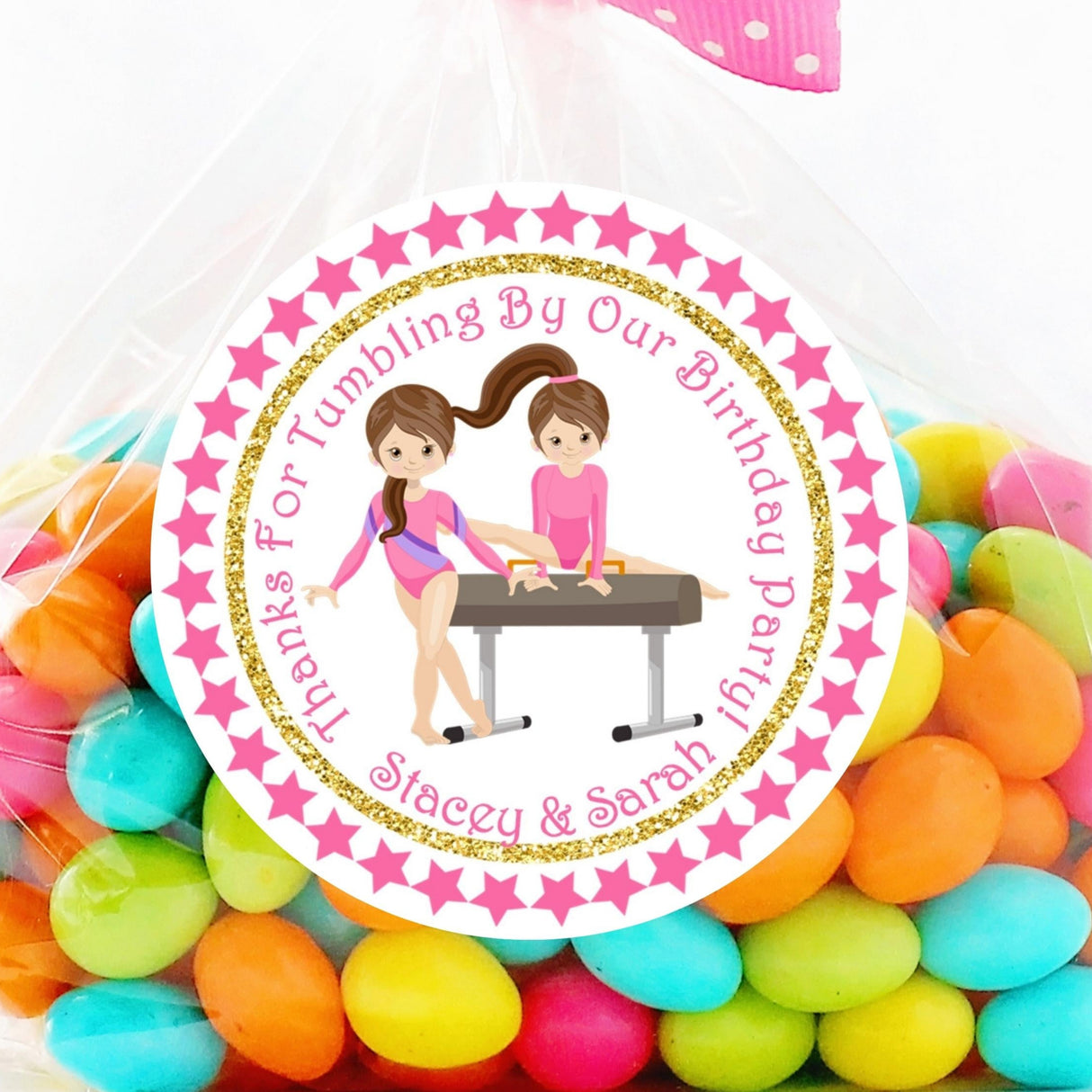Pink gymnastics birthday sticker with two girl gymnasts