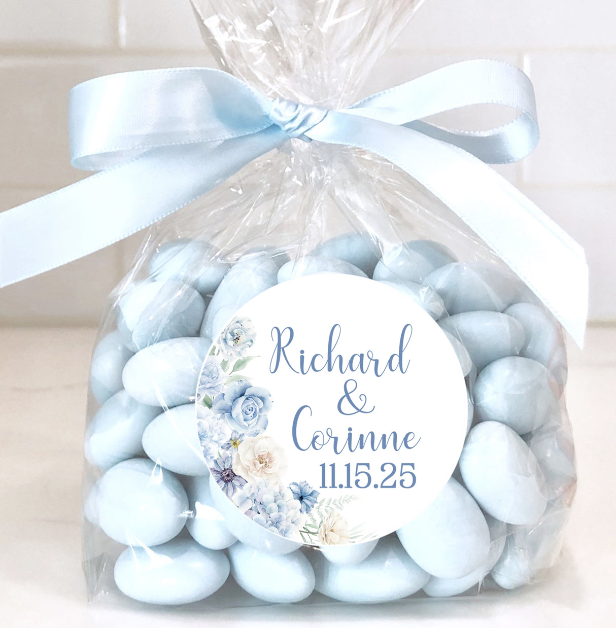 Watercolor blue wedding sticker with personalized names