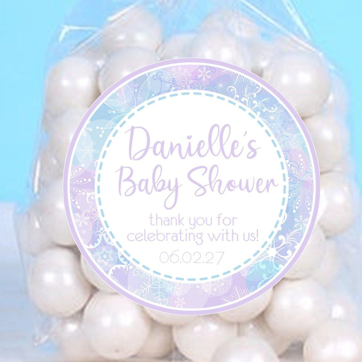 Custom pink and purple snowflake sticker for baby shower favors