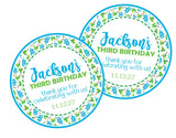 Blue and green baby dinosaur birthday sticker with personalized text