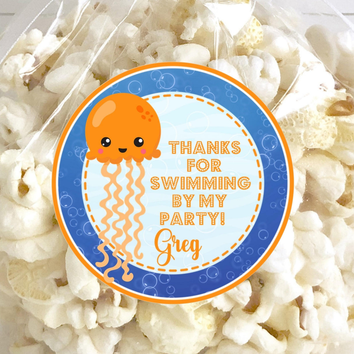 Blue and orange jellyfish birthday party sticker