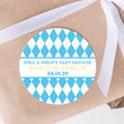 Blue argyle golf baby shower sticker with “Thanks FORE Joining Us” design.