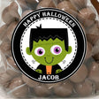 Cute Frankenstein Halloween sticker with green monster face and stitched details