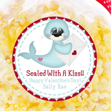 Cute seal Valentine sticker holding envelope with heart artwork