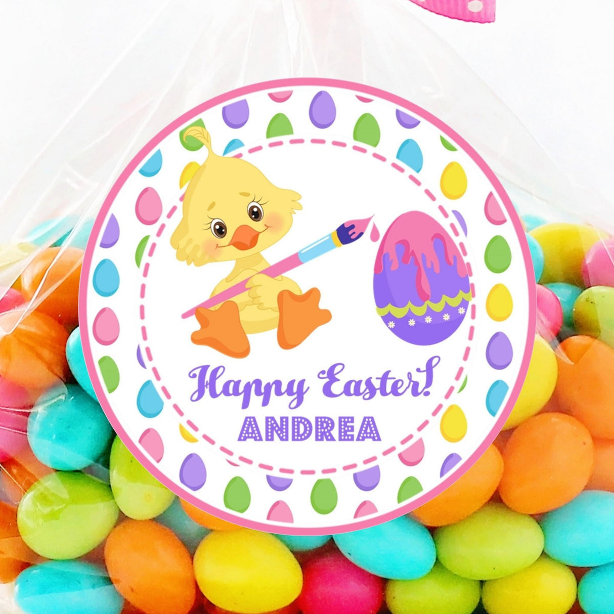 Easter chick sticker painting a colorful Easter egg