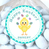 Easter sticker featuring a yellow chick surrounded by colorful decorated eggs