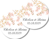 Elegant blush floral wedding favor stickers with delicate cherry blossoms and gold botanical accents.