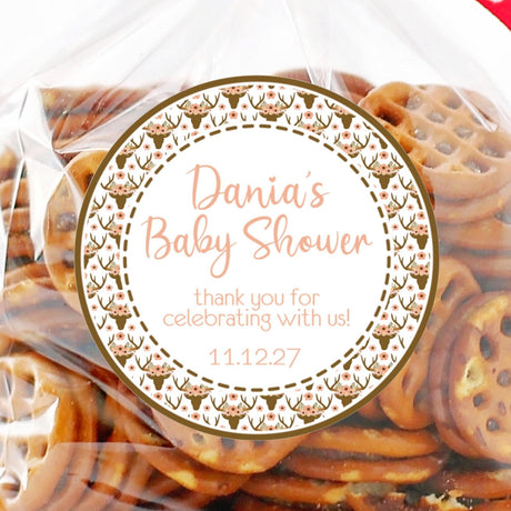 Floral deer baby shower sticker with antlers and flowers in peach and brown