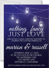 Navy blue wedding invitation featuring glowing bistro lights and romantic evening styling