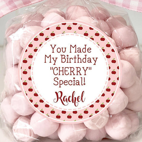 Pink cherry birthday sticker with plaid background
