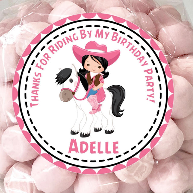 Pink cowgirl birthday sticker with black hair and white horse