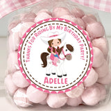 Pink cowgirl birthday sticker with girl riding white horse