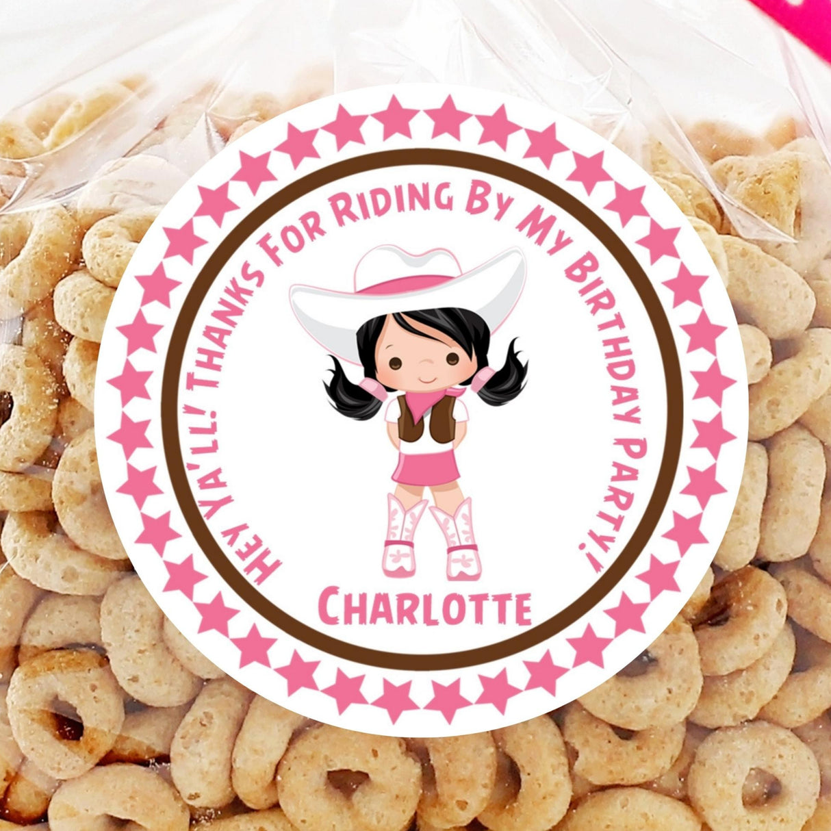 Pink cowgirl birthday sticker with pigtails and personalized name