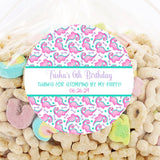 Pink dinosaur birthday sticker with bones and stars