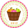 Pink pumpkin baby shower sticker with basket of pumpkins
