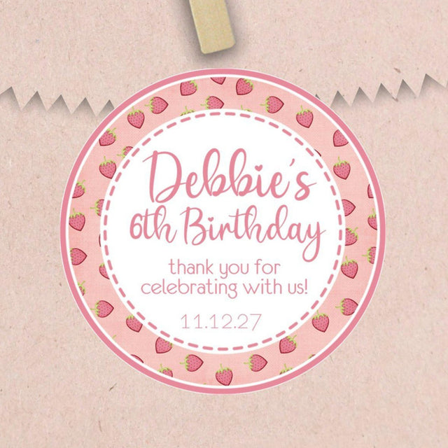 Pink strawberry birthday sticker with berry border