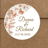 Round boho wedding envelope seal with dried botanicals