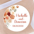 Terracotta floral wedding sticker with rust flowers and personalized names
