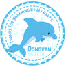 blue under the sea party sticker with dolphin design