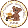 bumble bee baby shower sticker with teddy bear pushing honey wheelbarrow and dripping honey design