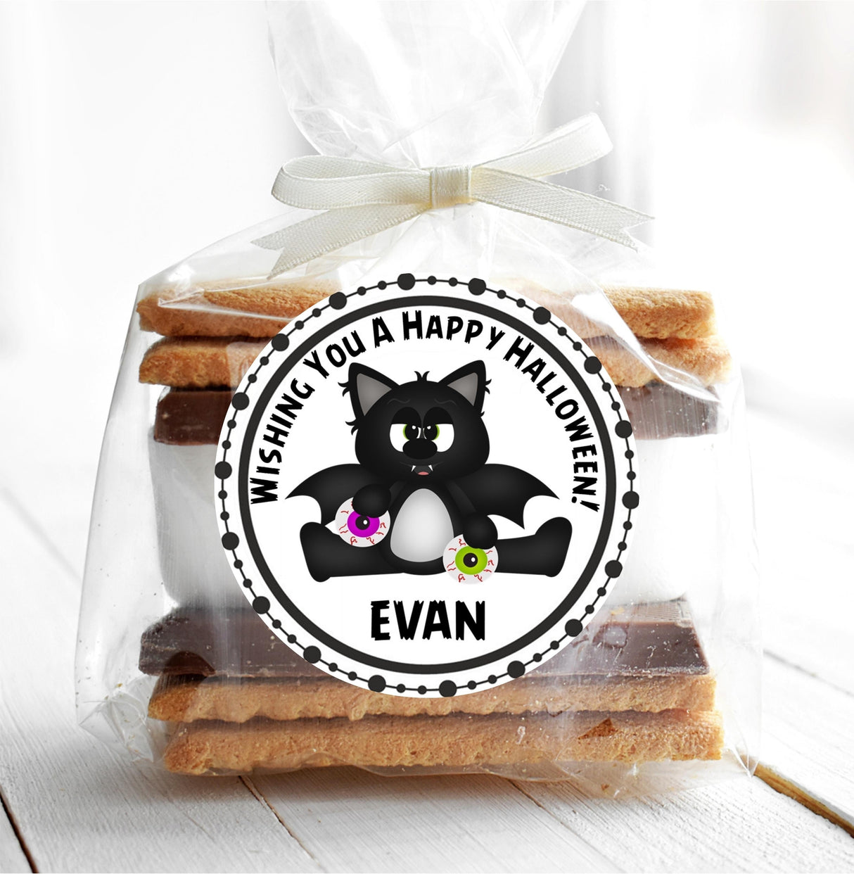 cute spooky halloween party sticker featuring bat wings and monster details