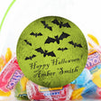 personalized halloween sticker with black bat silhouettes on textured green background