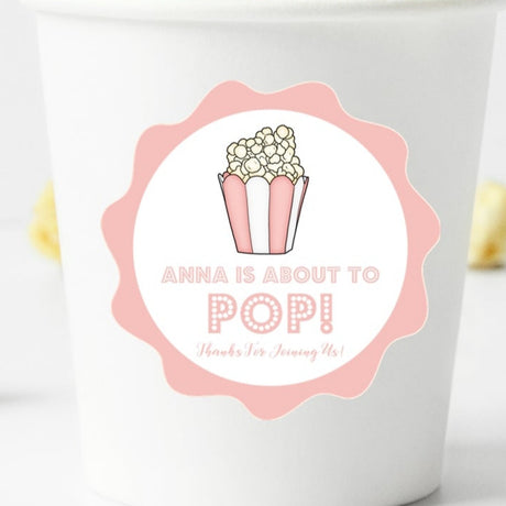 pink popcorn baby shower sticker with about to pop design