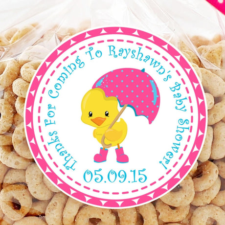 yellow duck baby shower sticker with pink polka dot umbrella