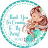 Brown-haired watercolor mermaid birthday sticker with teal tail