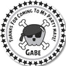 Grey pirate birthday sticker with skull and crossbones design