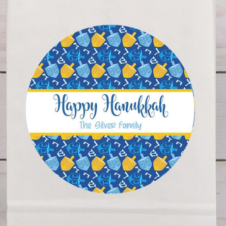 Happy Hanukkah dreidel stickers with blue and yellow dreidel pattern
