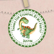 green dinosaur birthday sticker with orange spikes