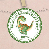 green dinosaur birthday sticker with orange spikes