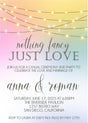 pastel rainbow wedding invitation featuring glowing string lights and romantic evening styling