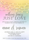 pastel rainbow wedding invitation featuring glowing string lights and romantic evening styling